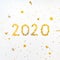 New 2020 Year golden star shaped confetti celebration background