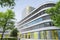New ADAC Headquarters 18-storey office tower rises above 5-storey base