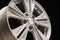 New aluminum alloy wheel, silver color on a black background