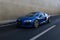 New Audi R8 V10 in motion on street with sunlight