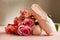 new ballet slippers lying on pink background with roses. elegant ballet shoes bouquet. beauty dance