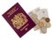 New Bergundy UK passport, no longer showing words `European Union`. With currency, pounds sterling. Isolated on white.