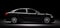 New black metallic sedan car in spotlight. Modern desing, brandless.