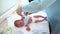 New born baby boy swaddled immediately after the caesarean section or C-section