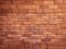 New Brown Terracotta Brick Blocks Wall Background Close Up, Pattern with Red Bricks or Brickwork House