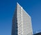 The new building against the blue sky.