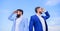 New business directions. Developing business direction. Businessmen bearded faces stand back to back sky background. Men