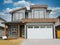 New Canadian Subdivision Home Grey Front Exterior Maison House Cloudy Sky Background