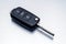 New car key fob on aluminium background. Repair of broken or damaged remote key fob of any vehicle car service concept.- Image