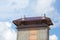 New chimney smokestack with metal box closeup.