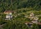 The new church, the old wooden church and the cemetery from Novaci-RomÃ¢ni-view from the Ungurenilor plain