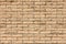 New and Clean Beige Brick Wall