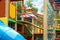 New colorful castle playhouse with climbing frame on children`s playground