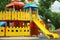 New colorful castle playhouse with slide on children`s playground