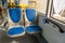 New comfortable seats inside a modern public bus. Seats on the bus for the elderly, people with disabilities and passengers with