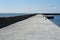 New concrete surface of the port entrance breakwater