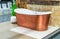 New copper bathtub at the exhibition for display