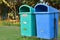 New Delhi government has installed a lot of green & blue dustbins throughout the city, this one in a park. The green ones for