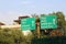 `New Delhi/India -21.06.2020: Sign Board In Green Showing Distance Of Agra , Noida , faridabad and kalindi kunj Texture White  Eng