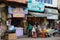 New Delhi, India - April 10, 2016 : Unidentified people at outdoors of small retail shop with fruits, in Paharganj Delhi