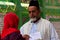 NEW DELHI, INDIA. MAY 26,2018: People read prayers in the premises of Hazrat Nizamuddin Dargah Complex, after the Iftar ceremony,