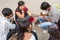 New Delhi, India - October 6 2013: A man makes a henna tatoo on