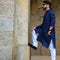 New Delhi India â€“ March 3 2020 : Man portrait, smart casual man, confident handsome man inside Hauz Khas Village Delhi India,