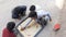 New Delhi India â€“ March 5 2021 : Street children playing carom board in the street, carrom board, Indian traditional indoor