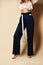 New design woman black pants casual girl apparel wear with belt on beige