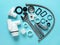 New disassembled sink waste water trap and adjustable wrench on a blue background. Kitchen sink drain with bottle trap and