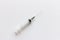 New disposable injection syringe on white background