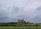 New England Country Barn with blue sky and grass