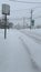 New England snowstorm .. fresh fallen.. signs covered