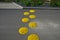 New established street in the city, the longitudinal parking lot is made of gray concrete infiltrating tiles with crevices filled