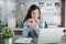 New generation asian business woman using laptop at office, Asian women sitting smiling while working on mobile office concept