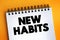 New Habits text on notepad, concept background