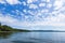 New Hampshire river on bright cloudy blue day