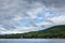 New Hampshire river on bright cloudy blue day