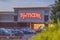 NEW HARTFORD, NEW YORK - AUG 16, 2019: TJ Maxx store and parking. TJ Maxx is an American department store chain, selling at prices