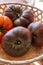 New harvest of big raddish-purple heirloom tomatoes Black Crimea