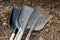 New and heavily used dirty shovels