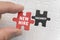 New hire words on a red puzzle piece filling a hole or open position on your staff or workforce