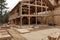 New home construction. build with wooden truss, post and beam framework.