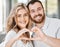 New home, couple and hand heart with key for moving, love and mortgage celebration portrait. Happiness, emoji and