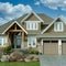 New Home House Exterior Grand Custom Brown Stucco Dwelling Double Garage