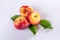 New hybrid sweet fruit nectarina platerina, flat Saturn or donut nectarine peaches close up