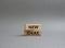 New ideas symbol. Concept word New ideas on wooden blocks. Beautiful grey background. Business and New ideas concept. Copy space