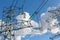 New large mast of an air power line close up, high voltage electricity pylon with thick wires and insulators, blue sky