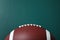 New leather American football on chalkboard