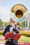 New Life Brass band, wind musical instrument player, orchestra performs music, man musician plays big sousaphone, trumpeter